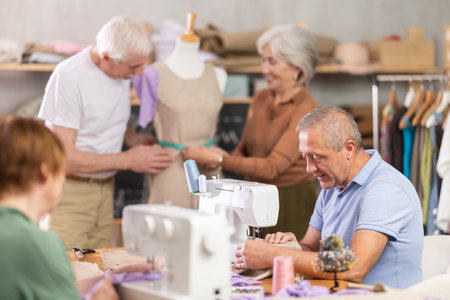 Group of elderly people at sewing master classの写真素材