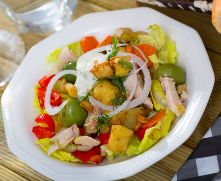 Salad with chicken, eggplants, greensの写真素材