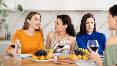Female friends having fun at intimate house party