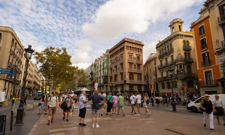 Crowded pedestrian Rambla street in Barcelona, summer day in center of tourist area of cityのeditorial素材
