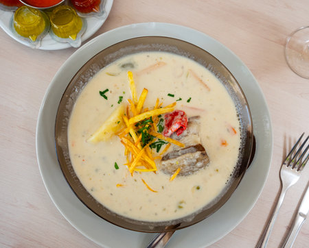 Latin American peanut soup sopa de mani with condimentsの写真素材