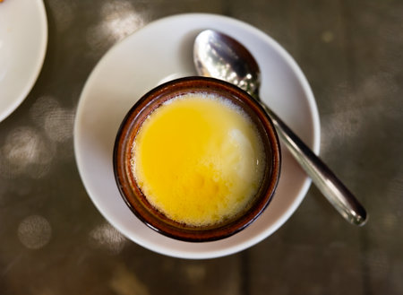 Clay pot contains fermented milk curd with honeyの写真素材