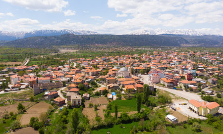 Drone view of Yesildag village in green valley surrounded by mountains, Turkeyの写真素材