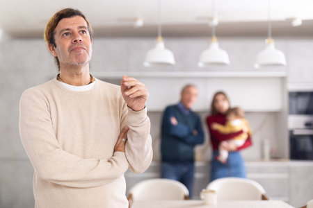 Man and girl quarrel with older manの写真素材