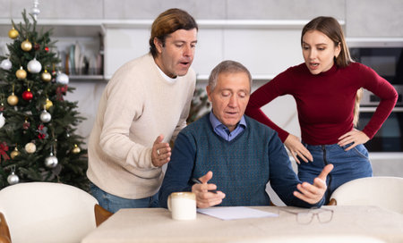 Family members discussing inheritanceの写真素材