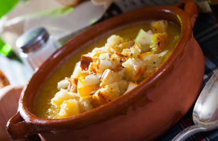 Cream soup with croutons and cheeseの写真素材