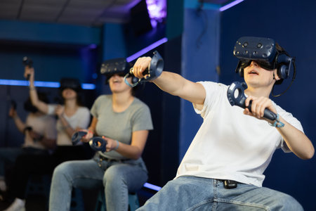 Man using virtual reality glasses delighted with videogames and new tech