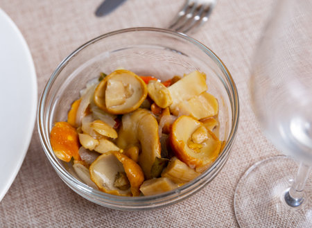 Boletus mushrooms marinated with onions close upの写真素材