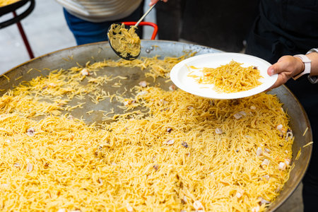 Fideua seafood portions served at street party