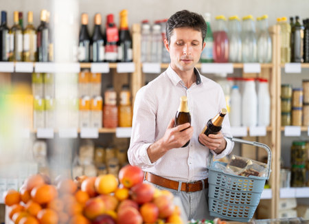 man chooses craft beerの写真素材