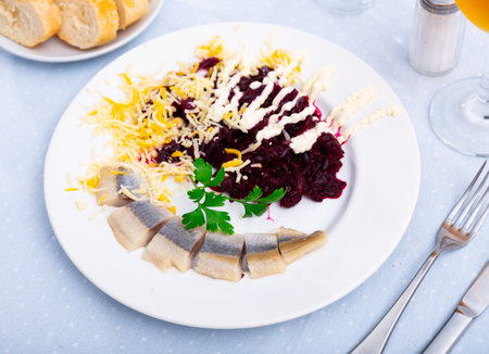 Beetroot served with cheese and pickled mackerelの写真素材