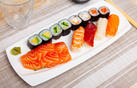 Set of different sushi maki, nigiri and sashimi close upの写真素材
