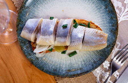 Appetizing sandwich with lightly salted herringの写真素材