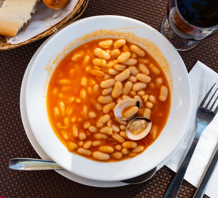 Top view of plate of beans stewed with clams.の写真素材