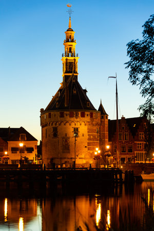 Harbour of Hoorn with sailboats at evening and the Hoofdtoren. Hoorn is harbor town at the Markermeer dating back to the 12th century, Hoorn, Netherlandsの写真素材