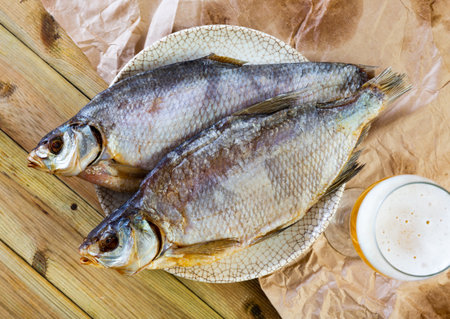 Tasty and salty dried bream nicely served as good snack for beerの写真素材