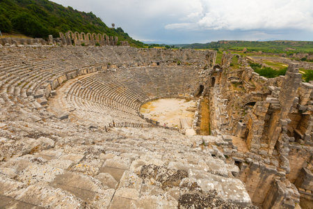 Ruins of ancient Lycian city Perge. Amphitheater still standingの写真素材