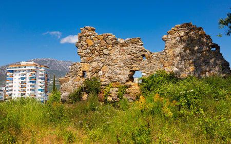 Naula Ancient City ruins among modern buildings of Mahmutlarの写真素材