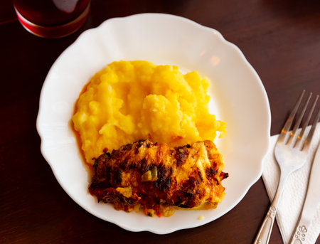 Traditional dish of Russian cuisine is chicken fillet with mushrooms with mashed potatoesの写真素材