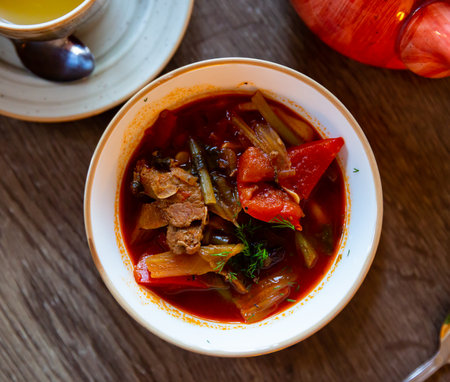 Thick spicy laghman with lamb meat, vegetables and noodlesの写真素材