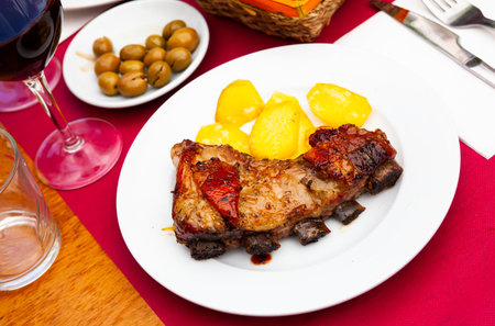 Just prepared honey glazed beef ribs with potatoの写真素材