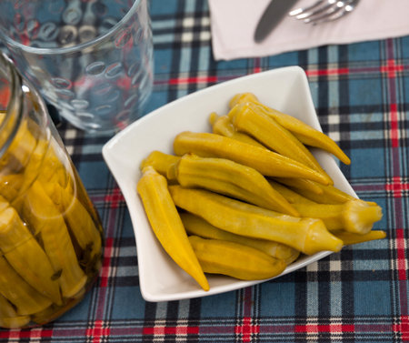 Marinated okra pods served on plateの写真素材