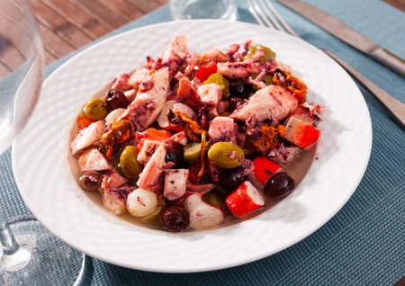 Delicious salad from variety of seafood with chopped vegetables (Salpicon de mariscos) typical for Spanish cuisineの写真素材