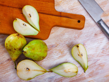 Cutted pears on wooden tableの写真素材