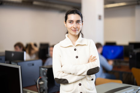 Young woman in computer design and information technology classroomの写真素材