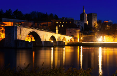 Night view of Pont St-Benezet and Avignon Cathedral, Franceの写真素材