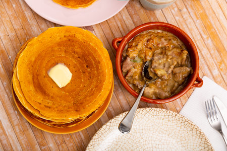 Pancakes with meat and vegetables stew machanka
