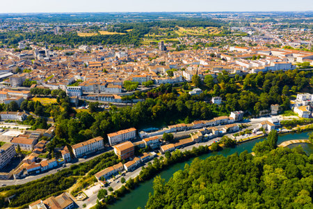 Flight over the city Angouleme on summer day