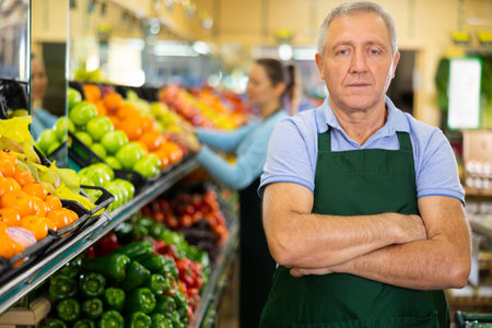 vegetable salesman in supermarketの写真素材