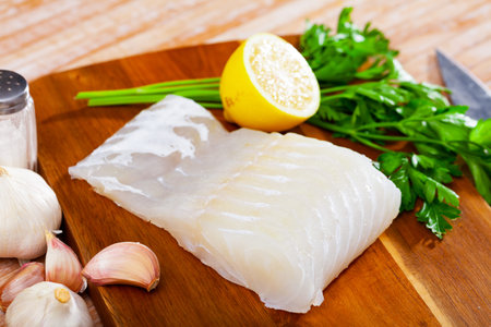 Raw pink cusk-eel fish fillet, seafood ingredients