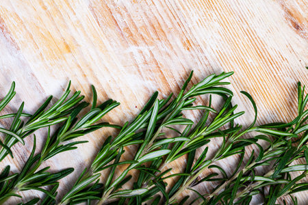 Closeup of rosemary on wooden tableの写真素材