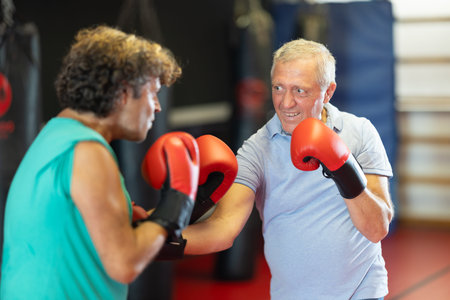 Two men boxing - boxing in gym