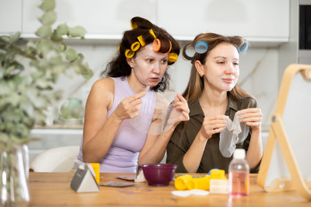 Adult and young women use face masksの写真素材