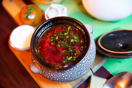 Russian borsch soup with meat and sour cream