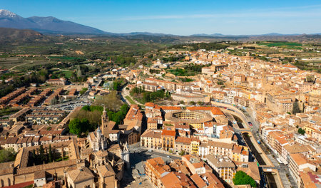 Aerial view of Tarazona cityscape with snow-capped Moncayo in backgroundの写真素材