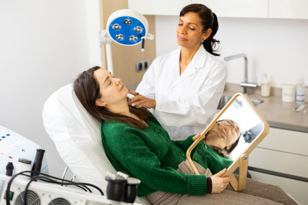 Woman having consultation at aesthetic medicine clinic