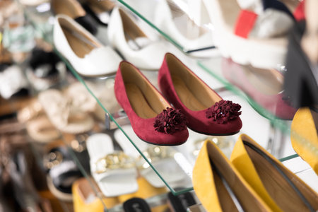 Showcase with models of ballet flats in shoe storeの写真素材