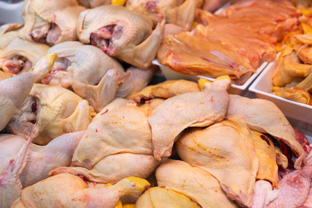 Whole chicken in fresh poultry departmentの写真素材