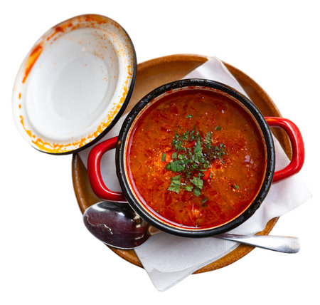 Traditional Slovak vegetable soup made with addition of sauerkraut and pieces of homemade sausage.