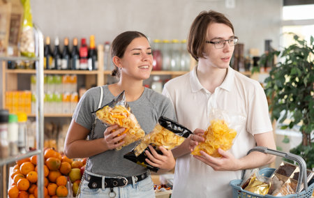 Couple opts for chips and crunchy mixesの写真素材