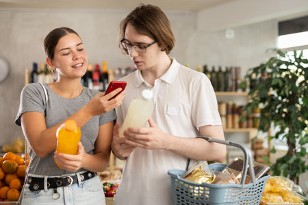 Couple man and woman scanning qr code for sodaの写真素材