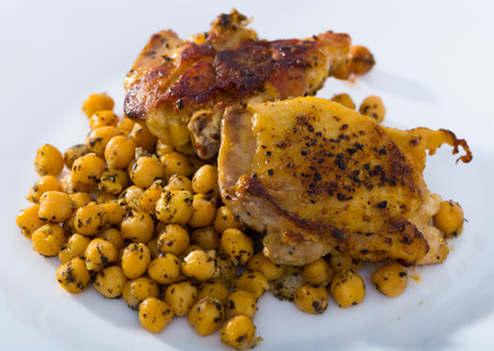 Roasted chicken thighs with chickpeasの写真素材