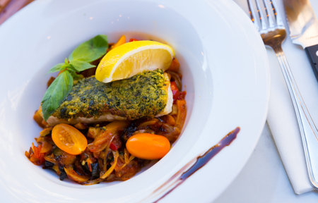 Red fish with stewed vegetables