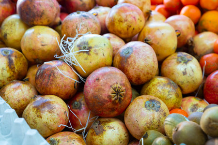 Close up of pomegranates in supermarketの写真素材