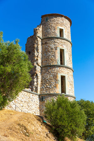 View of the medieval Grimaud Castle in the village of the same name in France