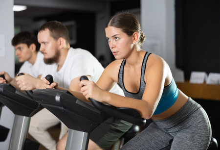 Woman exercising on an exercise bike
